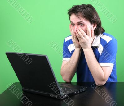man work with laptop