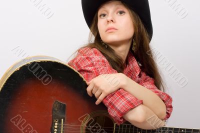 beautiful girl with a old guitar