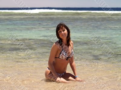 woman enjoying the sun on vacation