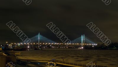Guy bridge in night.
