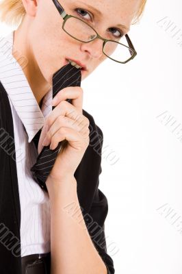 Woman with glasses eating her necktie