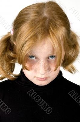 little girl is looking sad