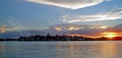 Sunset, lake and buildings