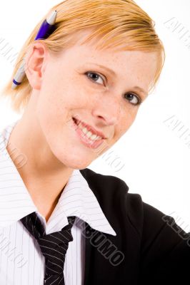 Business woman with a pen on her ear