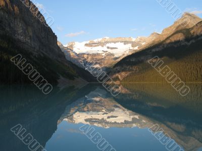mountains reflecting in a calm lake