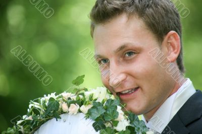 Groom with bouquet