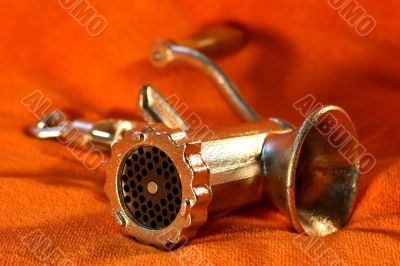 New mincer on an orange cloth.