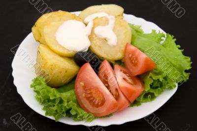 Potatoes, tomatoes and salad