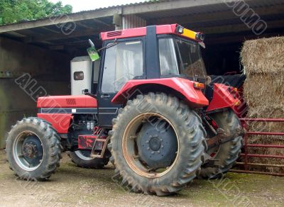 Red farm tractor