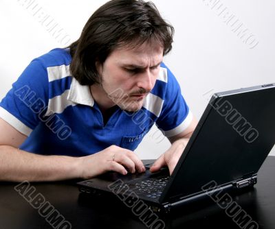 man work with laptop