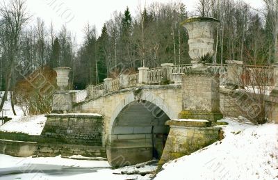 Old stone brige with vases