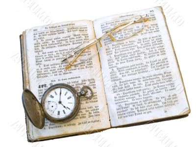 book with glasses and clock