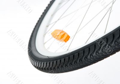 Bicycle wheel with orange reflector