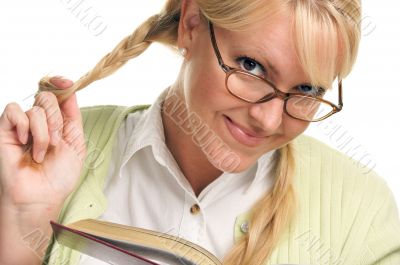 Female With Ponytails Reads Her Book