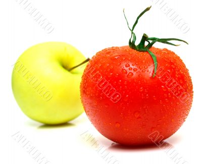Yellow apple and tomato
