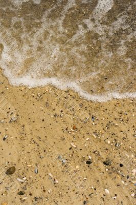 wave on a sandy beach