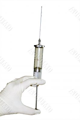  Gloved hand with a syringe