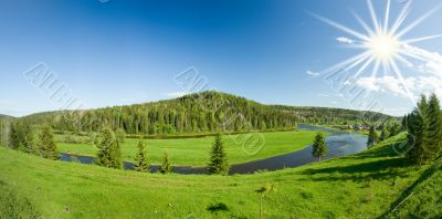 Summer landscape. Village on the river. Panorama.