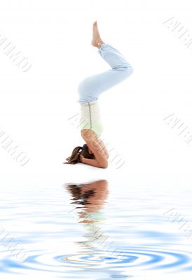 salamba sirsasana supported headstand on white sand