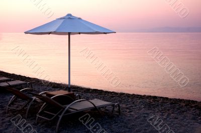 evening sea and umbrella