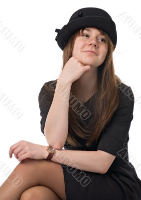 smiling young woman in black hat