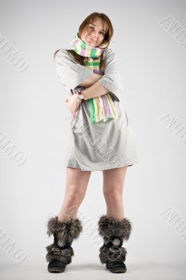 young woman in striped muffler