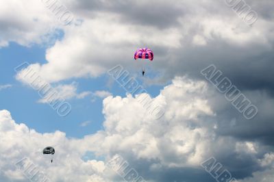 Two parachutes in the sky