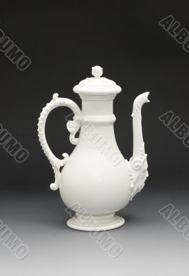 Graceful white teapot