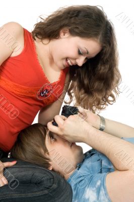 Photographer taking pictures of the young woman