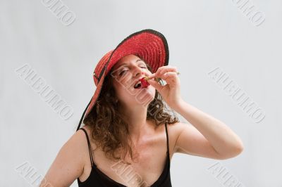 Woman, strawberry and hat