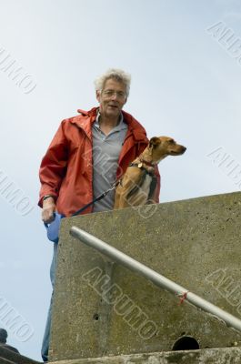 elderly man with dog