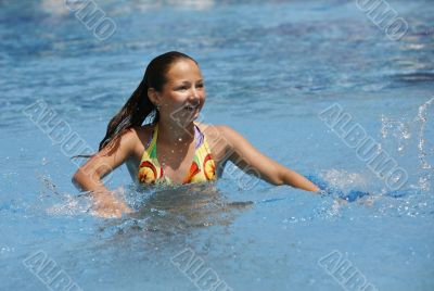 Girl - teenager at water-pool