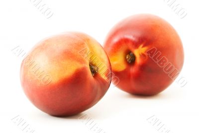 two fresh ripe peaches