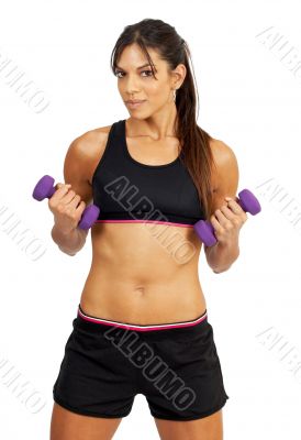 Beautiful brunette woman exercising