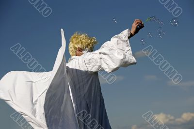 Angel with soap bubbles