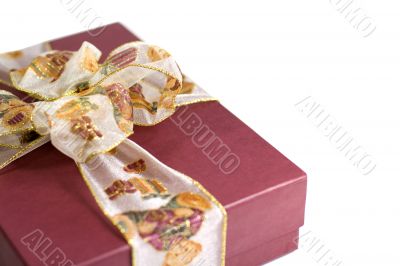 red gift box with beautiful ribbon