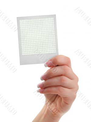 female hand holding a photo frame