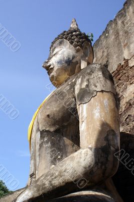 Buddha and wall