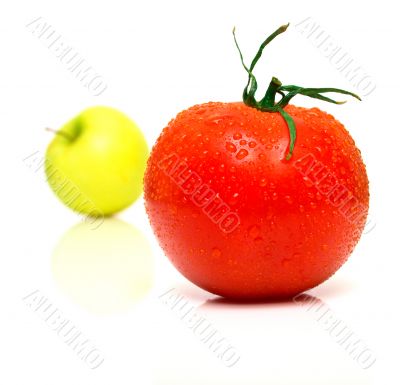 Yellow apple and tomato