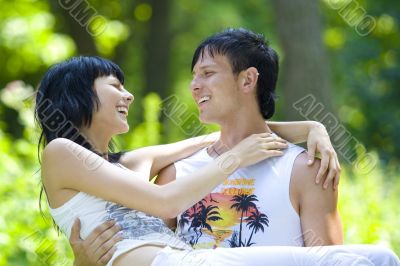 a young couple having fun in the park