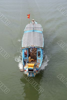 Boat on the green water