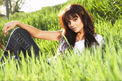 woman rest on the grass