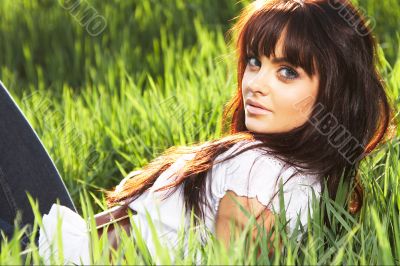 woman rest on the grass