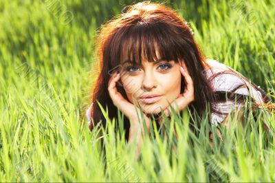 woman rest on the grass