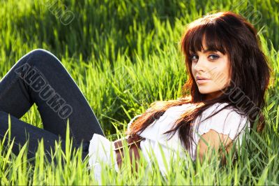 woman rest on the grass