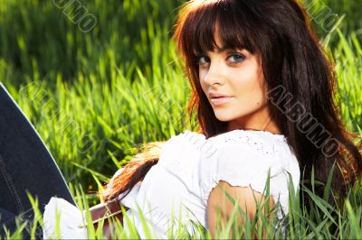 woman rest on the grass
