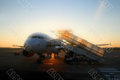 Airplane and sunrise