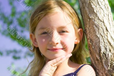 Smiling six year old girl at playground