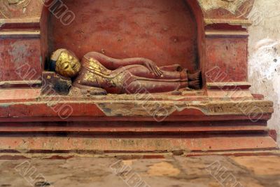 Red sleeping Buddha