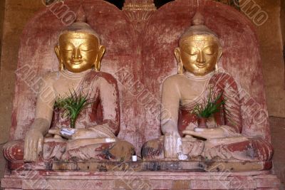 Two Buddhas with golden face